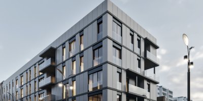 Edificio plurifamiliar contemporáneo con fachada moderna, balcones y diseño residencial urbano, asociado a servicios de headhunter en arquitectura, selección de arquitectos y captación de talento para estudios de arquitectura e inmobiliarias.